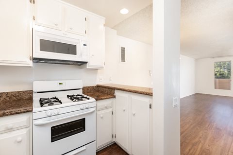 Kitchen with White Appliances and White Cabinets
